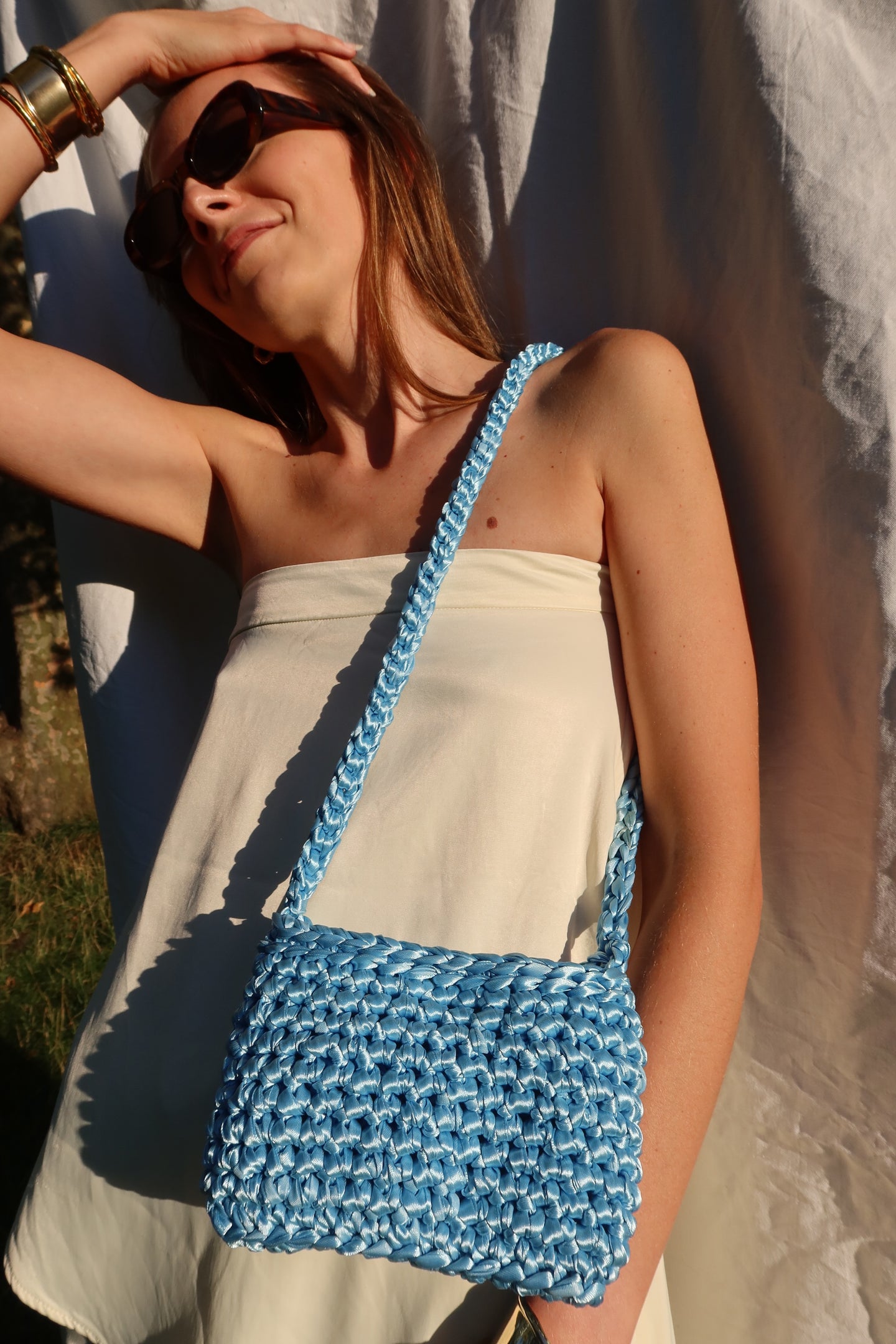 Baby blue bag with crochet strap