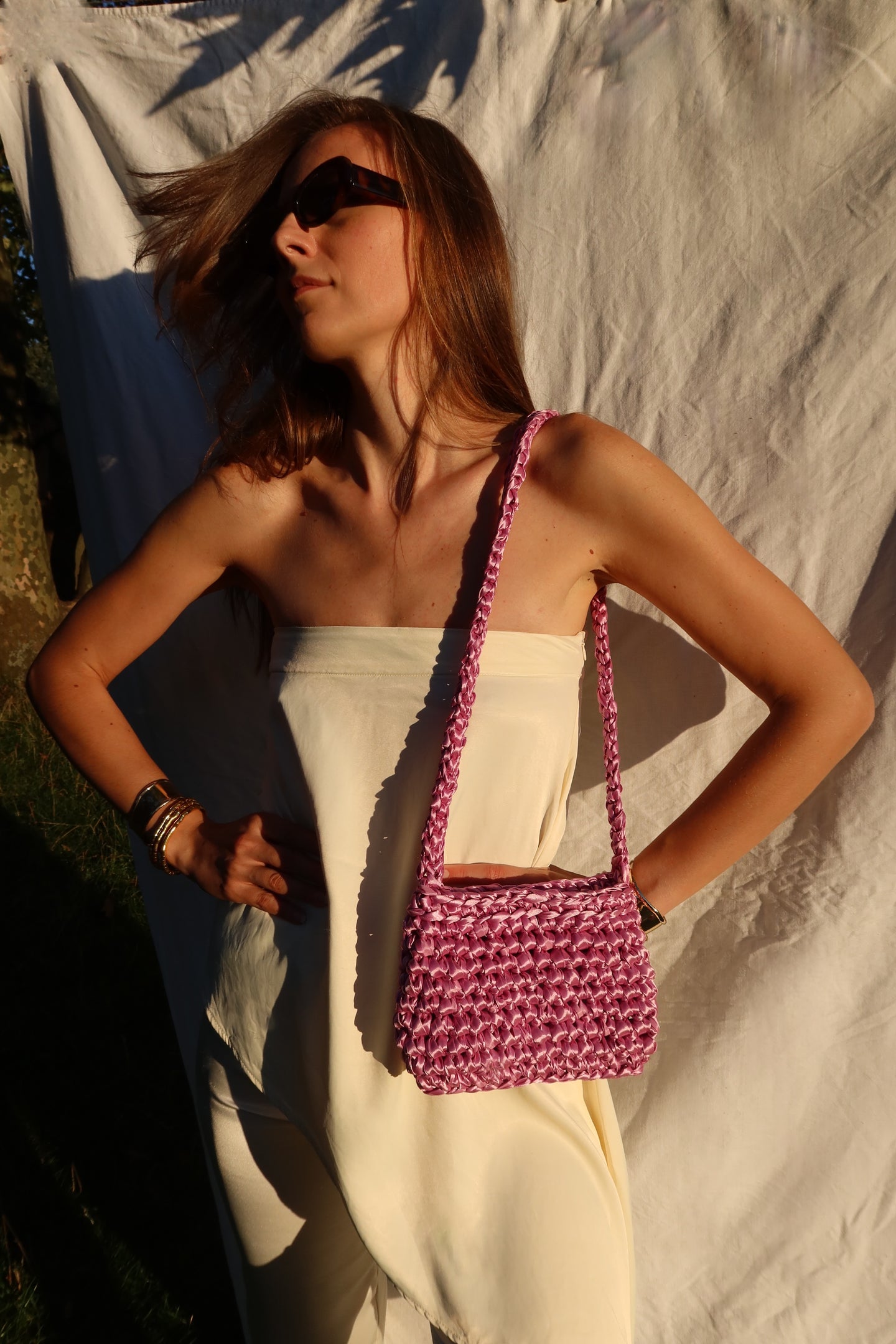 Purple bag with crochet strap