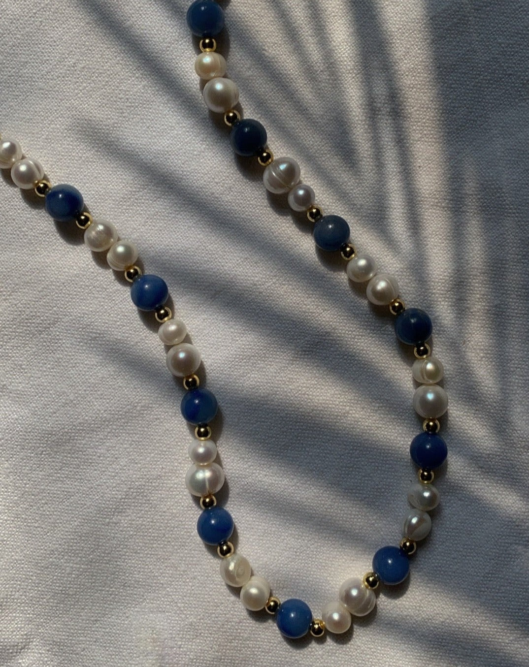 Blue pearls necklace